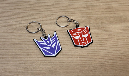 Transformers Insignia Keychains – Choose Your Side